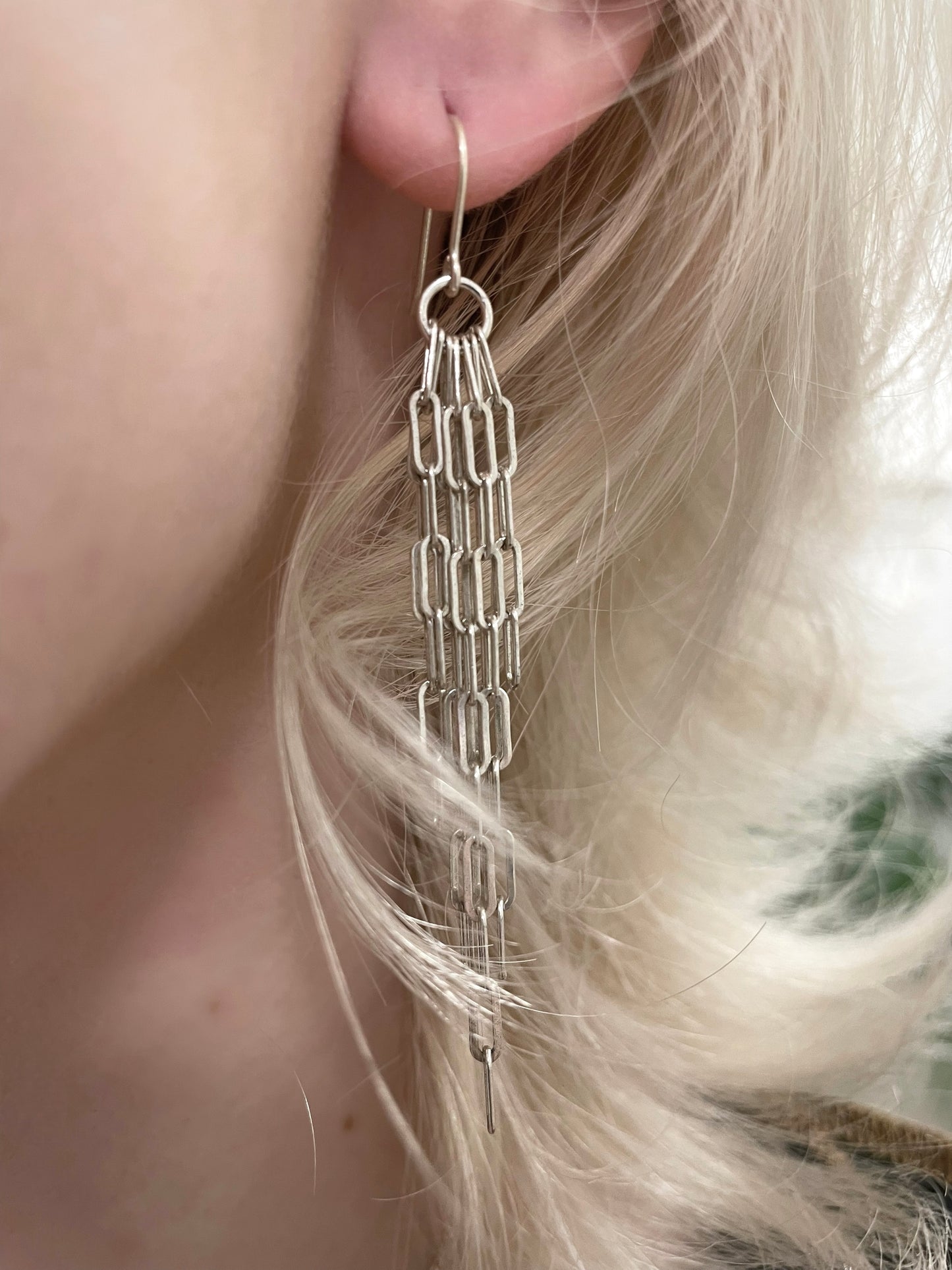 Adrianne drop earrings, chain link earrings, long earrings in silver on model