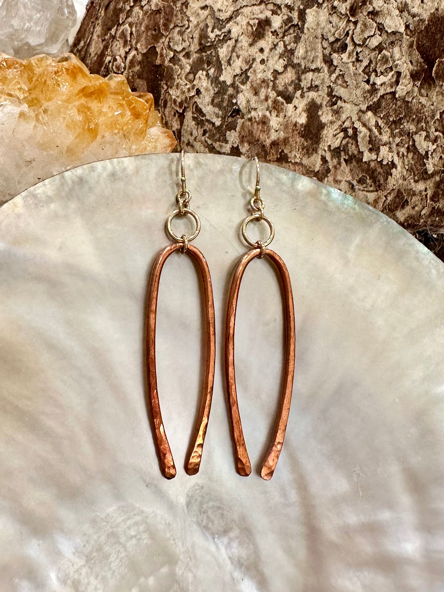 Inara drop earrings, copper earrings, gold and copper earrings on shell