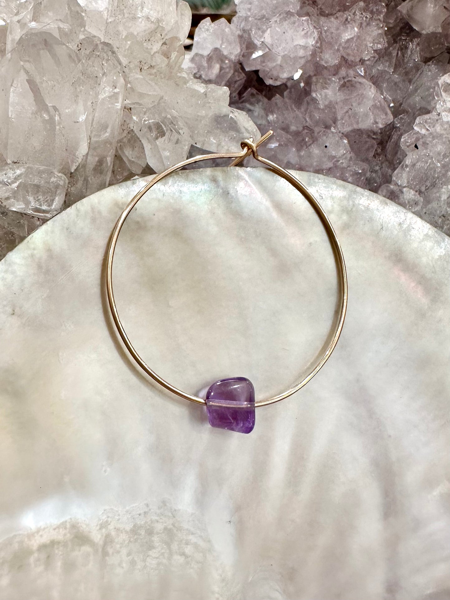 Elora amethyst hoop earrings, amethyst gold hoop earrings, amethyst earrings in gold on shell