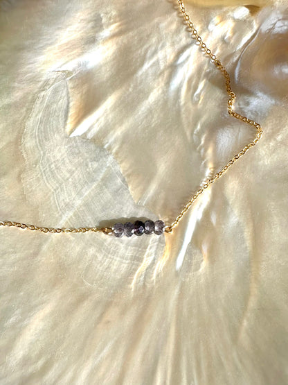 Capri necklace, violet stone necklace, iolite necklace in gold on shell