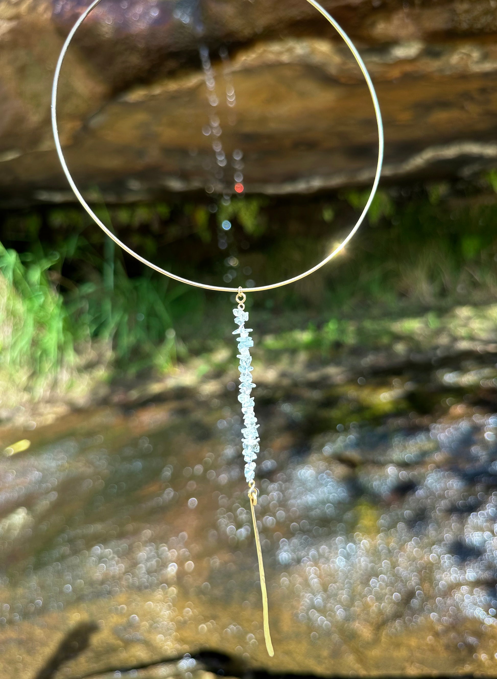 Giselle choker necklace, gold aquamarine necklace, hanging view waterfall