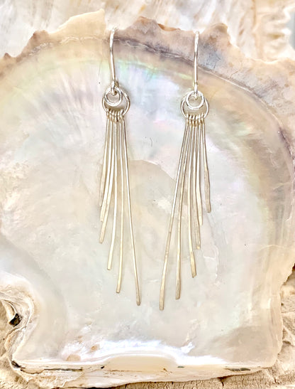 Indaliai drop earrings, hammered silver earrings, silver earrings on shell